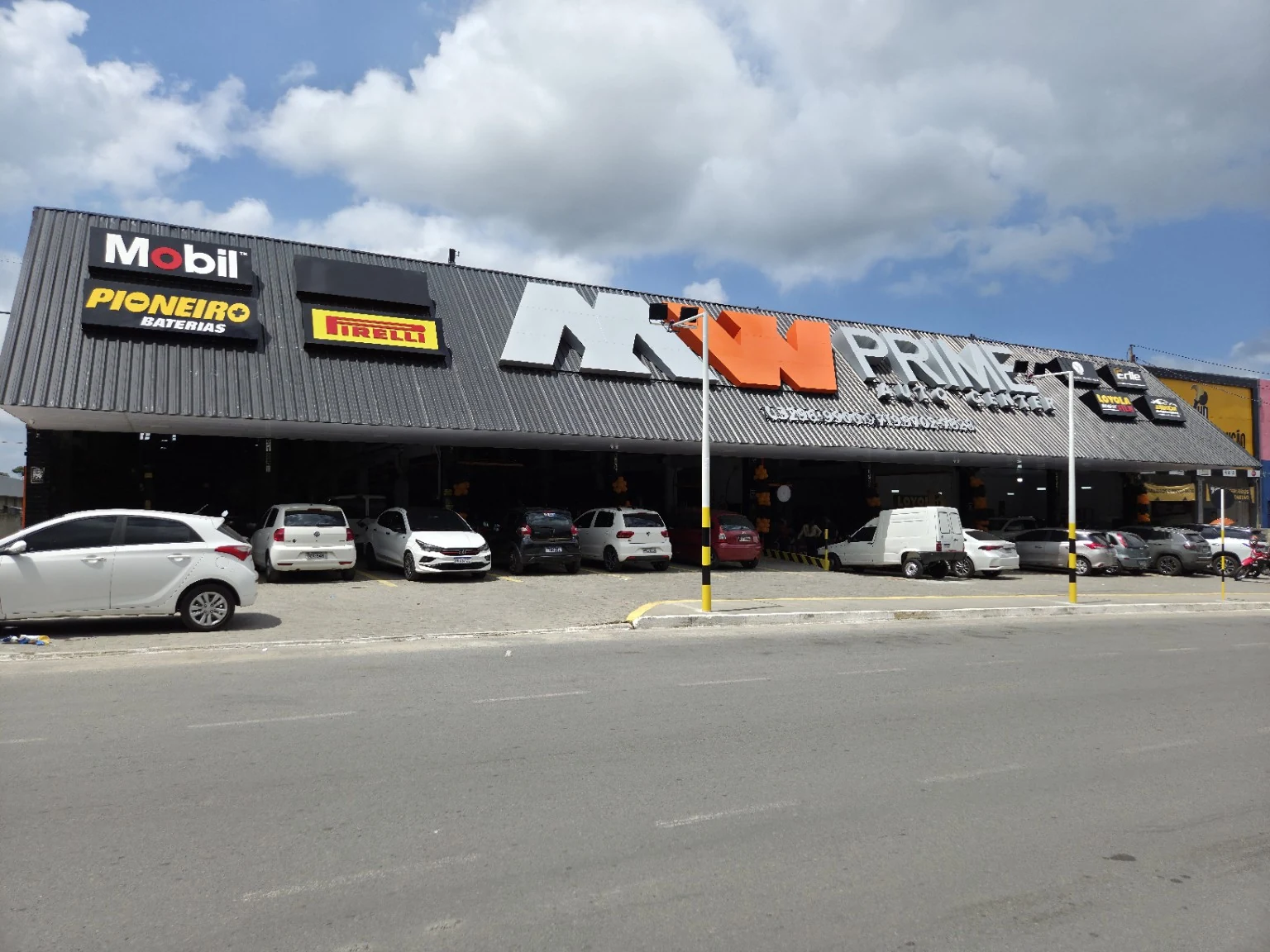 MW Prime · letreiro e placas executados pela Psete